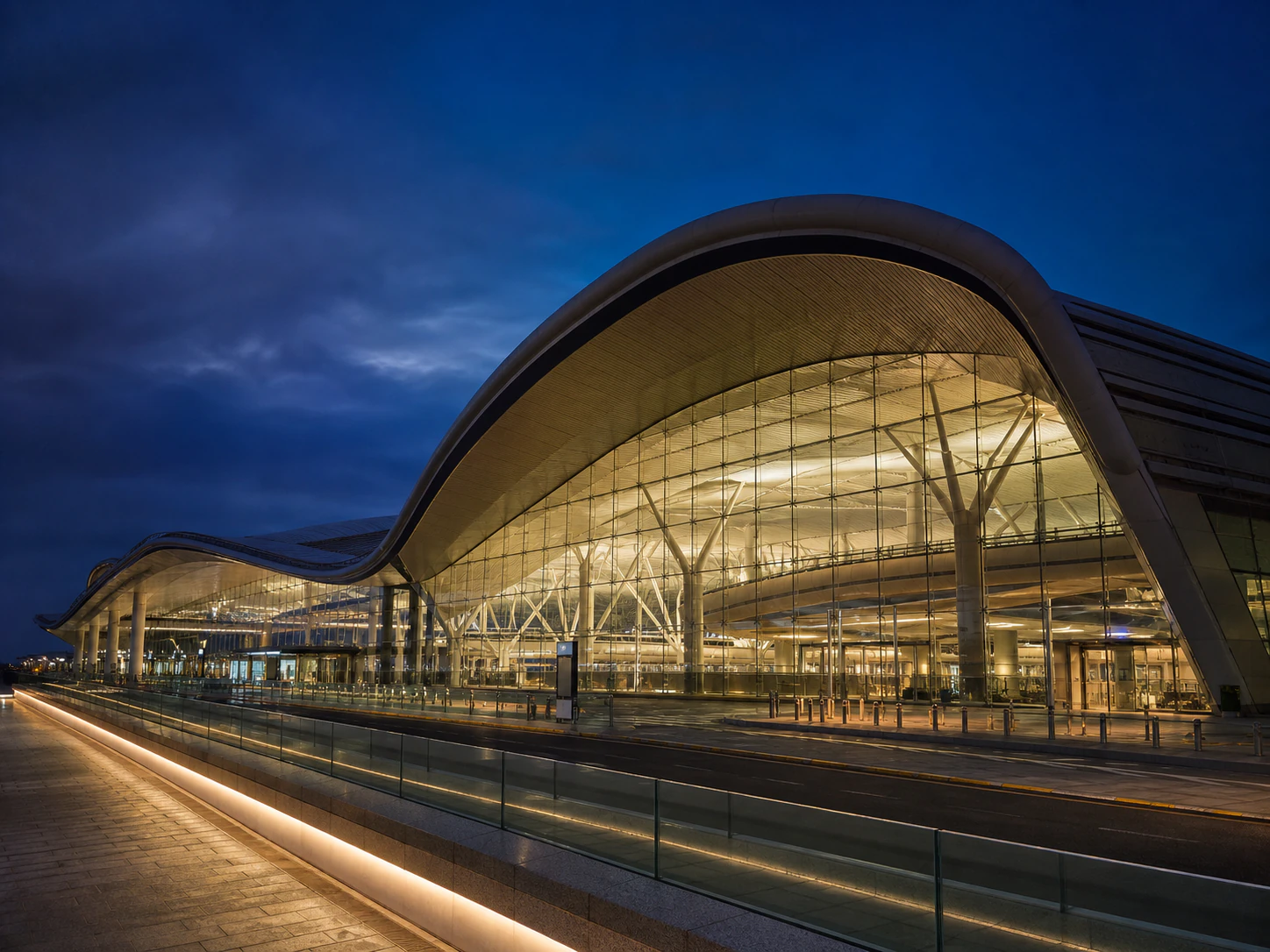 Hong Kong International Airport terminal at dusk